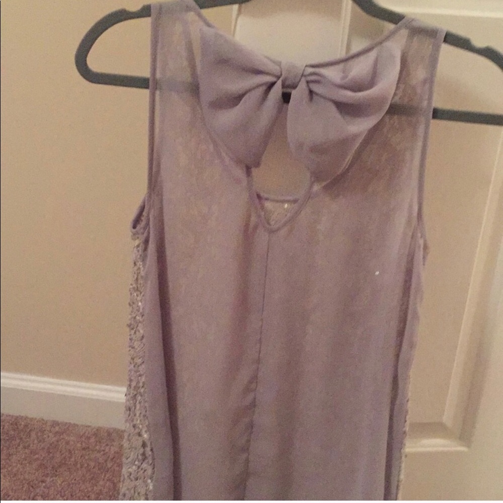 Daytrip top. Bow on the back.